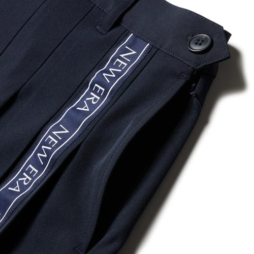 GFW PLEATS SK VERTICAL LOGO
