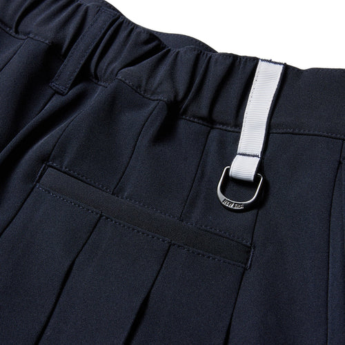 GFW PLEATS SK VERTICAL LOGO