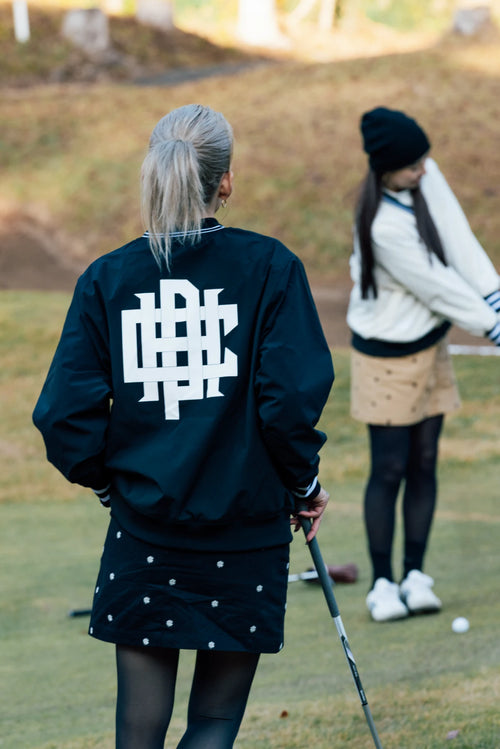 OVERLAP LOGO 2 TUCK SKIRT