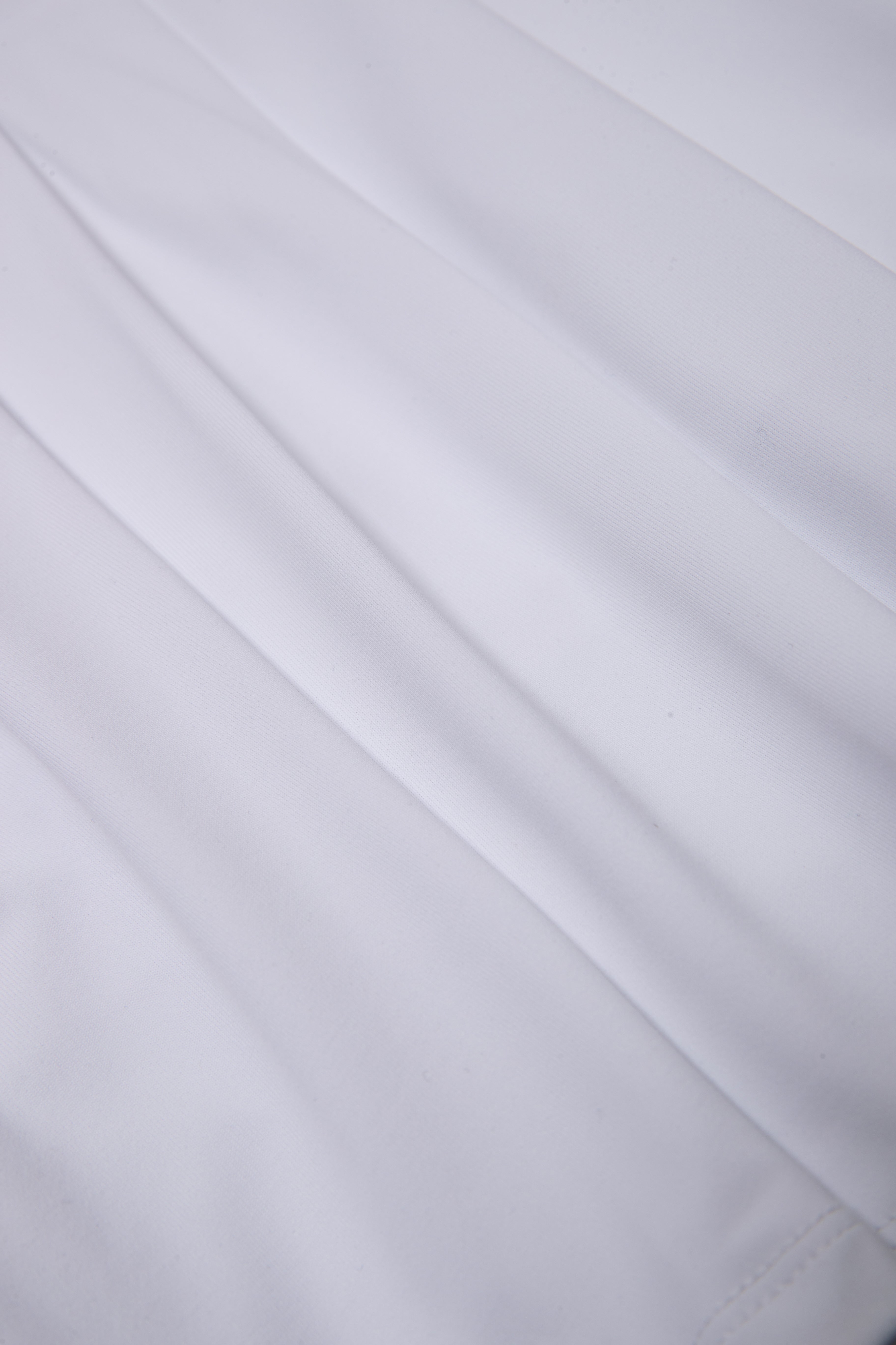 RUFFLOG CURSIVE LOGO SKIRT WHITE