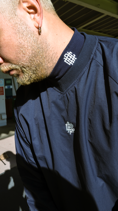 #OVERLAP LOGO NYLON PULLOVER NAVY