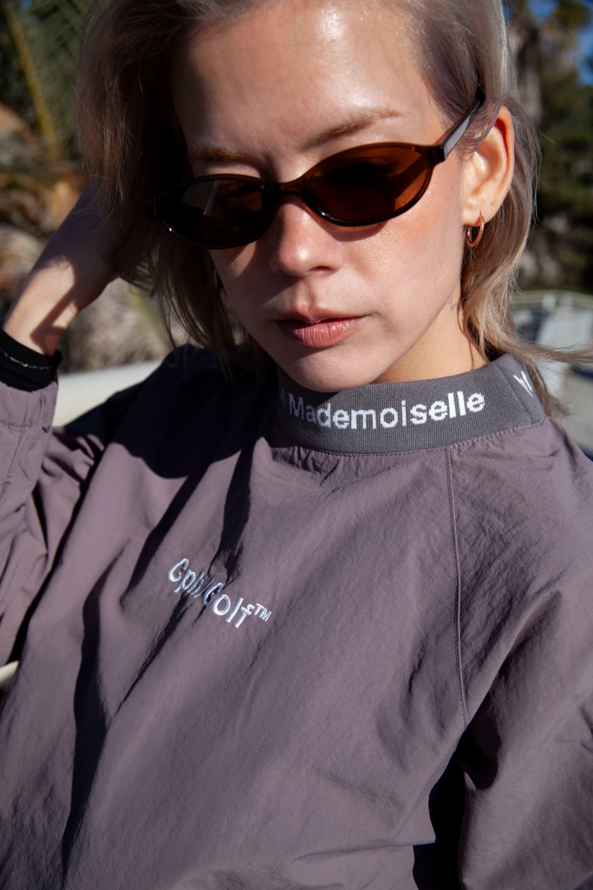 WOMEN] JACQUARD MOCK NECK WIND BREAKER｜若年層向けゴルフアパレル